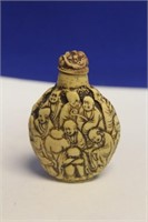 A Carved Resin Snuff Bottle