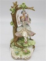 CAPODIMONTE STYLE FIGURE ON SWING 11 IN TALL