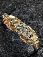$1280 10K  1.47G, 3 Diamonds 0.15Ct Ring