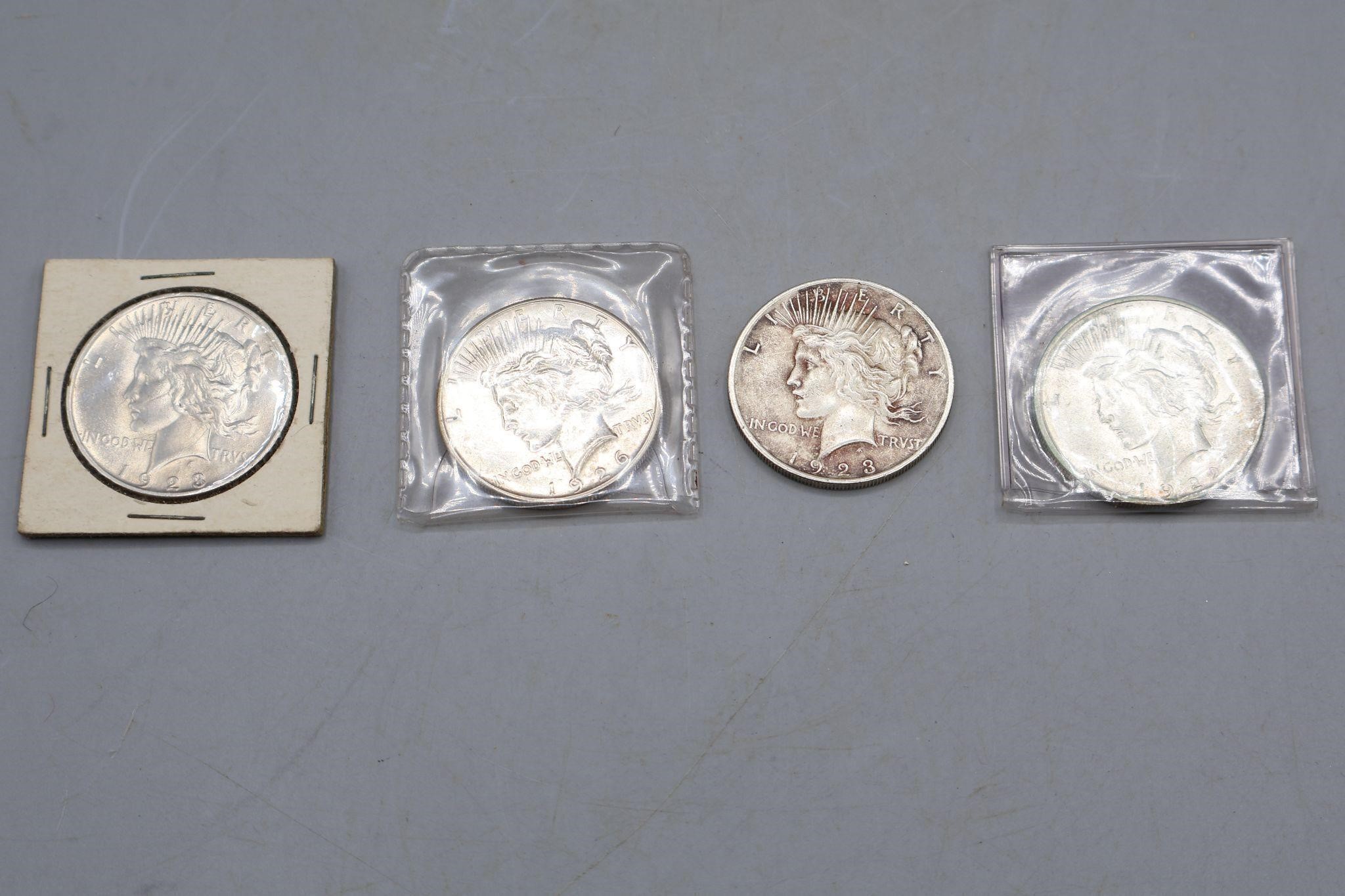 Four Peace Silver Dollars Circa 1920's