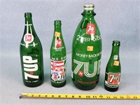 4- 7UP Soda Bottles