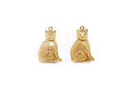 Two yellow gold cat charms