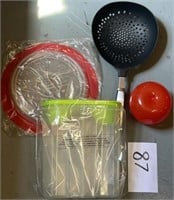 Household lot; strainer; pouring container & more