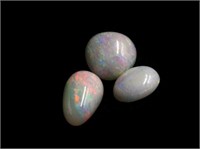 Three Australian solid dark opals 7.10ct