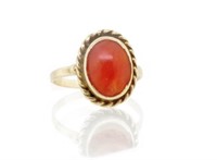 Mid C. coral & 9ct yellow gold ring