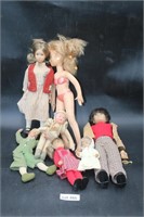 (7) Assorted In Size Dolls
