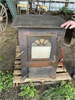 Coal burning forced air stove