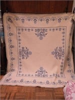 Handstitched quilt with cross stitch design,