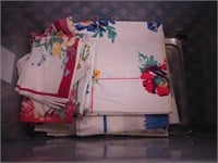 Six vintage cotton tablecloths and 11 cotton