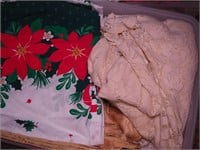 Container of vintage linens, mostly tablecloths