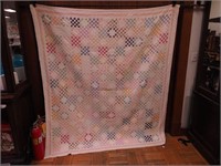 Vintage hand- and machine-stitched quilt with