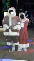 Mr. and Mrs. Claus’s life-size standup cardboard