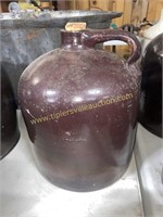 Brown stoneware jug glazed