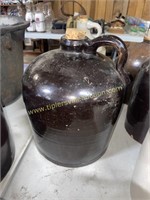 Brown stoneware gallon jug