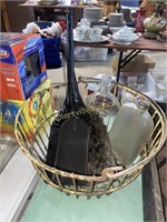 Metal basket with scoops and bottles