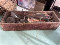 Wooden box of primitive kitchen items