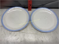 Pair of blue trimmed milk glass plates