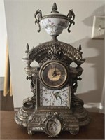 Stunning porcelain and brass mantel clock