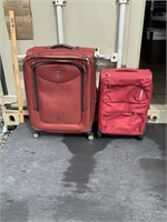 PAIR OF RED LUGGAGES