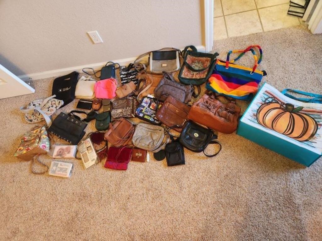 Lot of purses, wallets and bags