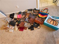 Lot of purses, wallets and bags