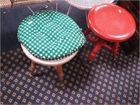 Two wooden piano stools with ball and claw feet
