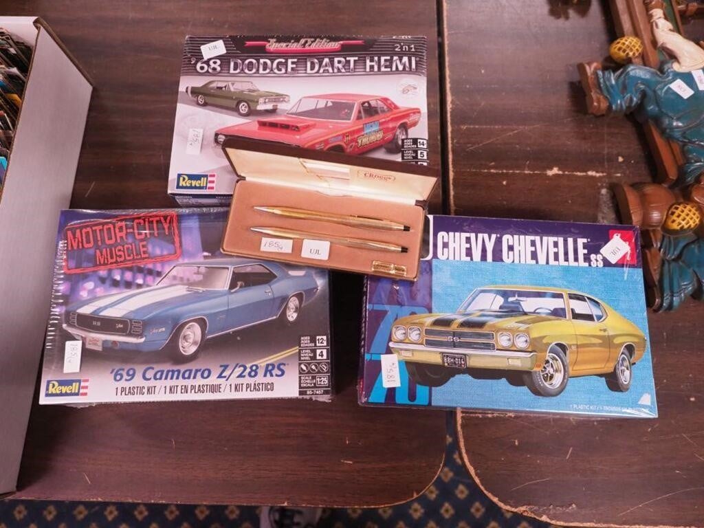Three model car kits in sealed boxes: 1969