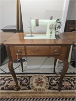 Vintage wood cabinet singer sewing machine