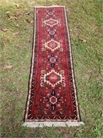 Large red and blue entry may rug