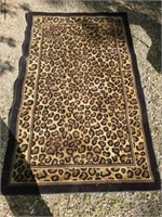 58" by 93" cheetah rug