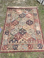 91" by 63" area rug
