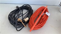 Two extension cords, one 16 ga 100’ and the black