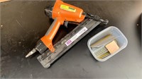 Central Pneumatic Air Nailer with some nails