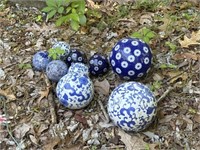 9 blue and white decorative spheres