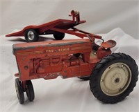 Vintage Tru Scale toy tractor and trailer