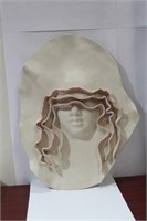 A Modern Ceramic Head Wall Hanger