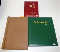 Three albums of world stamps