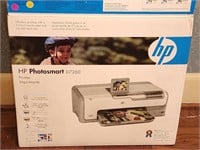 New in box HP photo smart printer.   Model
