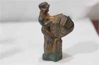 A Polychrome Worker Figurine
