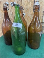 3 brown 1 green Lg bottles with porcelain corks