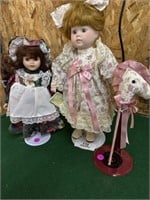 2 Porcelain dolls w/extra stand