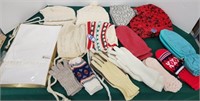 Lot of childrens hats gloves mittens and a scarf
