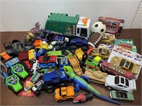 Box of toys - Trucks/cars, dinosaurs etc…