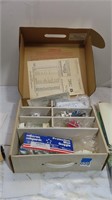box of school science equipment