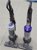 Two Dyson Upright Vacuum Cleaners