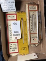 Group of advertising thermometers