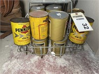 Group of oil cans & wire rack
