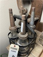 (4) oil bottles with metal carrying rack