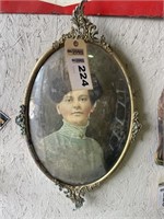 Lady's portrait in unusual metal frame