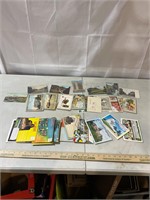 Assorted postcards, some in booklets and sleeves
